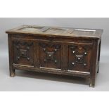 OAK COFFER, late 17th or early 18th century, the triple panel top enclosing a candlebox interior,