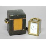 FRENCH BRASS MINIATURE CARRIAGE TIME PIECE, the enamelled dial inscribed Drew & Sons, Piccadilly