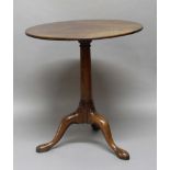 GEORGE III MAHOGANY TRIPOD TABLE, the circular tilt top on a turned column and tripod base with