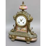 FRENCH GILT METAL AND PORCELAIN MOUNTED MANTEL CLOCK, the 3 1/4" enamelled dial with blue roman hour