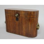 REGENCY MAHOGANY AND INLAID DECANTER BOX, of rounded rectangular form with lion mask handles, the