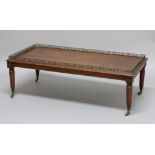 VICTORIAN WALNUT LOW TABLE, with a brass, galleried top and tapering legs, height 39cm, width 107cm,