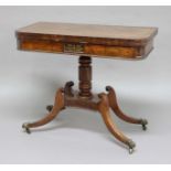 REGENCY MAHOGANY AND CROSSBANDED FOLD OUT TEA TABLE, the rounded rectangular top above a frieze with
