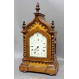 VICTORIAN GOTHIC OAK CASED MANTEL CLOCK, the 6 1/2" enamelled dial inscribed with an indistinct