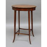 REGENCY SATINWOOD WORK TABLE, the inlaid oval top with leather-lined interior on tapering, splayed