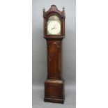 GEORGE III MAHOGANY LONGCASE CLOCK, the 12" painted dial beneath an arched panel and with maidens to