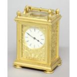 GILT BRASS CARRIAGE CLOCK, the 1 3/4" enamelled dial with black roman numerals on a brass, eight day