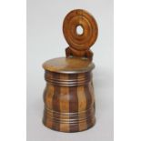 LIGNUM VITAE BANDED SALT OR CANDLE BOX, 19th century, of cylindrical form, height 28.5cm
