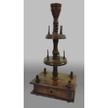 19TH CENTURY PINE SEAMSTRESS' COMPANION, with two platforms on a turned column and rectangular base,
