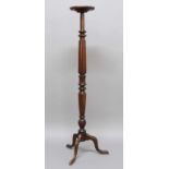 GEORGE III MAHOGANY TORCHERE, with a tray top, reeded column and tripod base, height 151cm