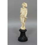 NELSON: early 19th century carved ivory figure, he standing in his full regalia holding a telescope,