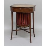 REGENCY MAHOGANY SEWING TABLE, the octagonal top enclosing a fitted interior above a work bag