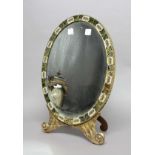 VENETIAN STYLE OVAL EASEL MIRROR, the plate inside a verre eglomise frame and carved & gilded