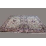 KIRMAN CARPET, South East Iran, circa 1940, woven as one piece in the format of rugs, each with an