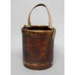 LEATHER BUCKET, with strap handle and brass studs, height 31cm, width 27cm