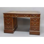 MAHOGANY TWIN PEDESTAL DESK, retailers label for Waring of Manchester, the leather writing surface