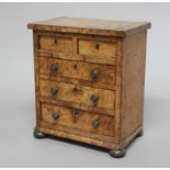 VICTORIAN BURR WALNUT MINIATURE CHEST OF DRAWERS, two short over three graduated long with turned