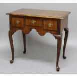 WALNUT LOWBOY, 18th century, the quarter-veneered rectangular top above three drawers on cabriole