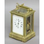 FRENCH BRASS CARRIAGE CLOCK, the enamelled dial on a brass, eight day repeating movement half hourly