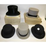 BOXED TOP HAT a black top hat by Moss Bros, Covent Garden, in a Herbert Johnson box. Also with a