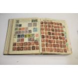 TWO STAMP ALBUMS including a Oppen's Postage Stamp Album with mostly used content, including