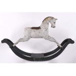 ANTIQUE ROCKING HORSE an antique painted wooden rocking horse, mounted on a wooden sleigh base.