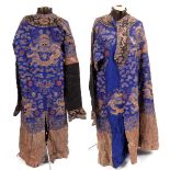 19THC CHINESE DRAGON ROBE a late 19thc unlined blue silk Chinese Dragon robe, worked with couched