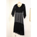 BRETON VELVET DRESS an early 20thc black velvet and grosgrain dress with lined tailored bodice,