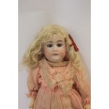 PETER SCHERF DOLL a German bisque head doll with weighted blue eyes, open mouth and jointed body.