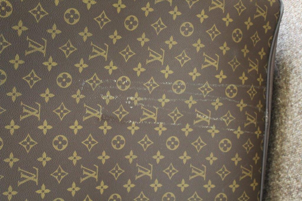LOUIS VUITTON SUITCASE a large suitcase with monogrammed exterior and leather handles and strap, - Image 3 of 15