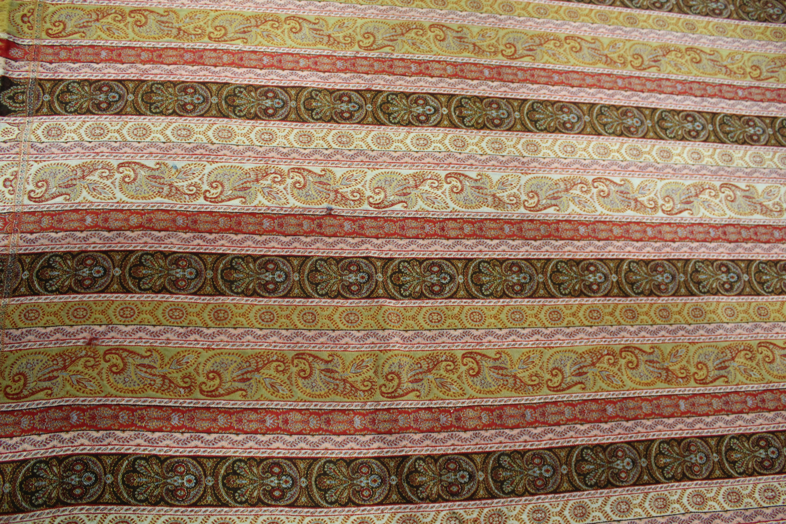 LARGE PAISLEY SHAWL a large wool shawl with repeating floral motifs within horizontal bands, and - Image 7 of 7