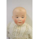 GEBRUDER HEUBACH - LARGE CHARACTER DOLL the large doll with moulded hair, intaglio eyes and closed