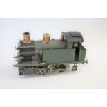 LIVE STEAM LOCOMOTIVE a 0-4-0 live steam locomotive in green livery, no boilers certificate. 32cms
