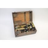 REICHERT CASED MICROSCOPE a brass and metal monocular microscope with two lenses, marked C Reichert,