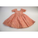 18THC SILK CHILD'S DRESS a silk child's dress, pleated to the waist with lace fastening bodice (
