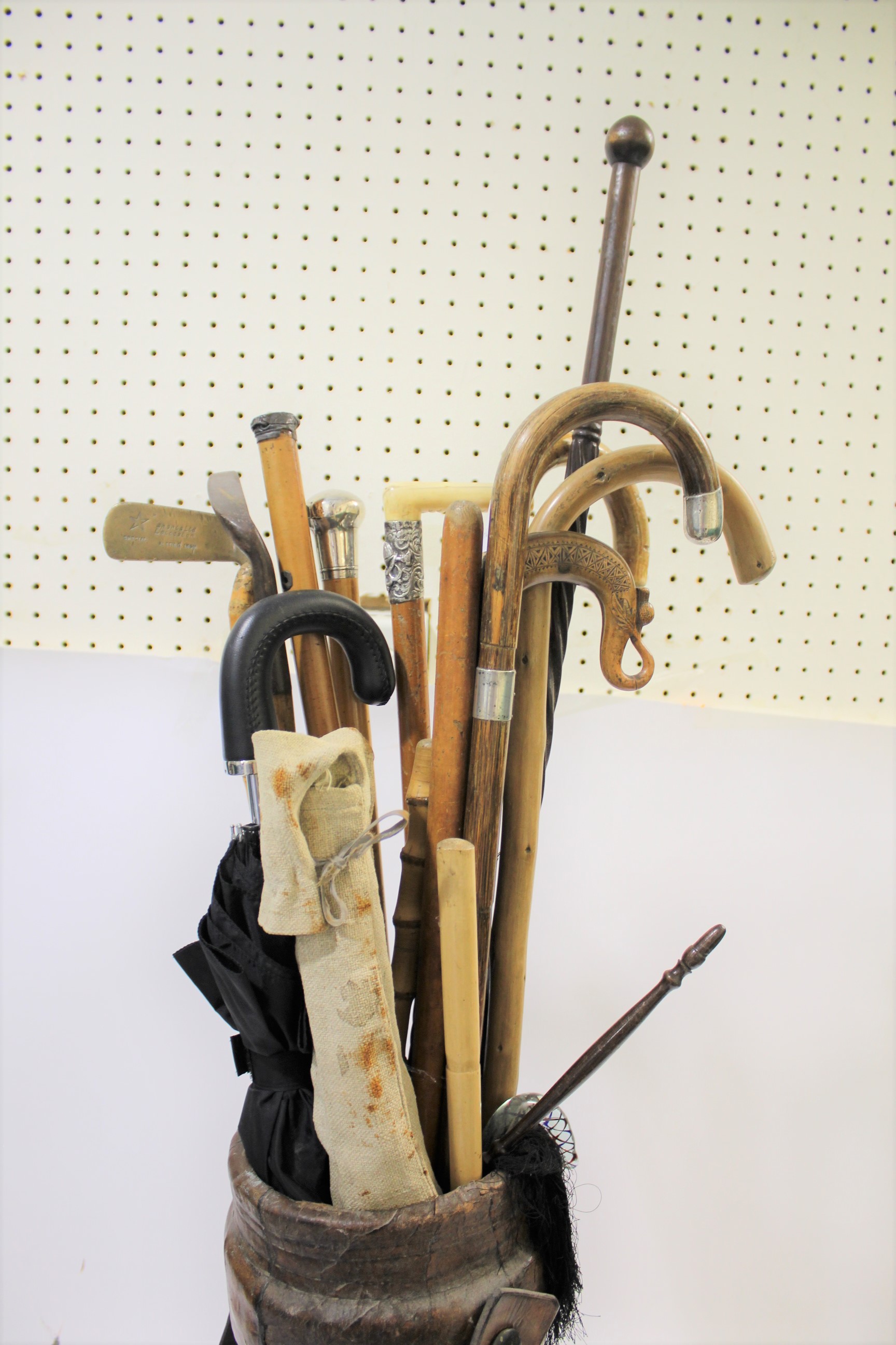 LEATHER STICK STAND - WALKING STICKS & UMBRELLAS a leather stick stand (cannon ball holder) with a - Image 2 of 7