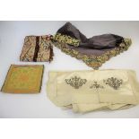 EARLY TEXTILES including a 19thc wool and bead cross stitch cushion cover, a fine brown silk