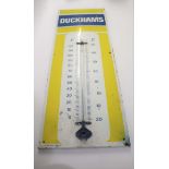 DUCKHAMS ADVERTISING ENAMEL SIGN a large enamel sign with attached thermometer, and with