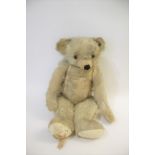 LARGE MERRYTHOUGHT TEDDY BEAR an early Merrythought Bear with elongated arms, swivel head and orange