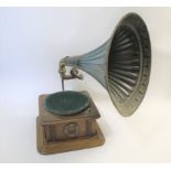 HORN GRAMOPHONE the gramophone with an oak base, the metal arm supporting a tin horn. With a Saturn,