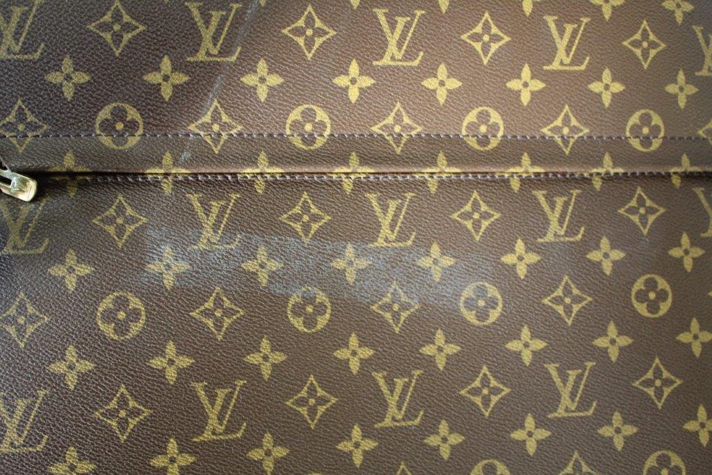 LOUIS VUITTON SUITCASE a large suitcase with monogrammed exterior and leather handles and strap, - Image 9 of 15