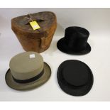 LEATHER CASED TOP HAT a fitted leather case with a black Top Hat by Dunn & Co, Piccadilly Circus (