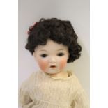 GEBRUDER HEUBACH DOLL the doll with weighted brown eyes, open mouth and bent limb body. Marked,