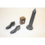 TREEN including a ebony model of a tower, with a turned base, and 2 ebony models of shoes. Also with