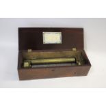 19THC MUSICAL BOX a musical box with a fold down flap on one side, to reveal 3 brass levers and
