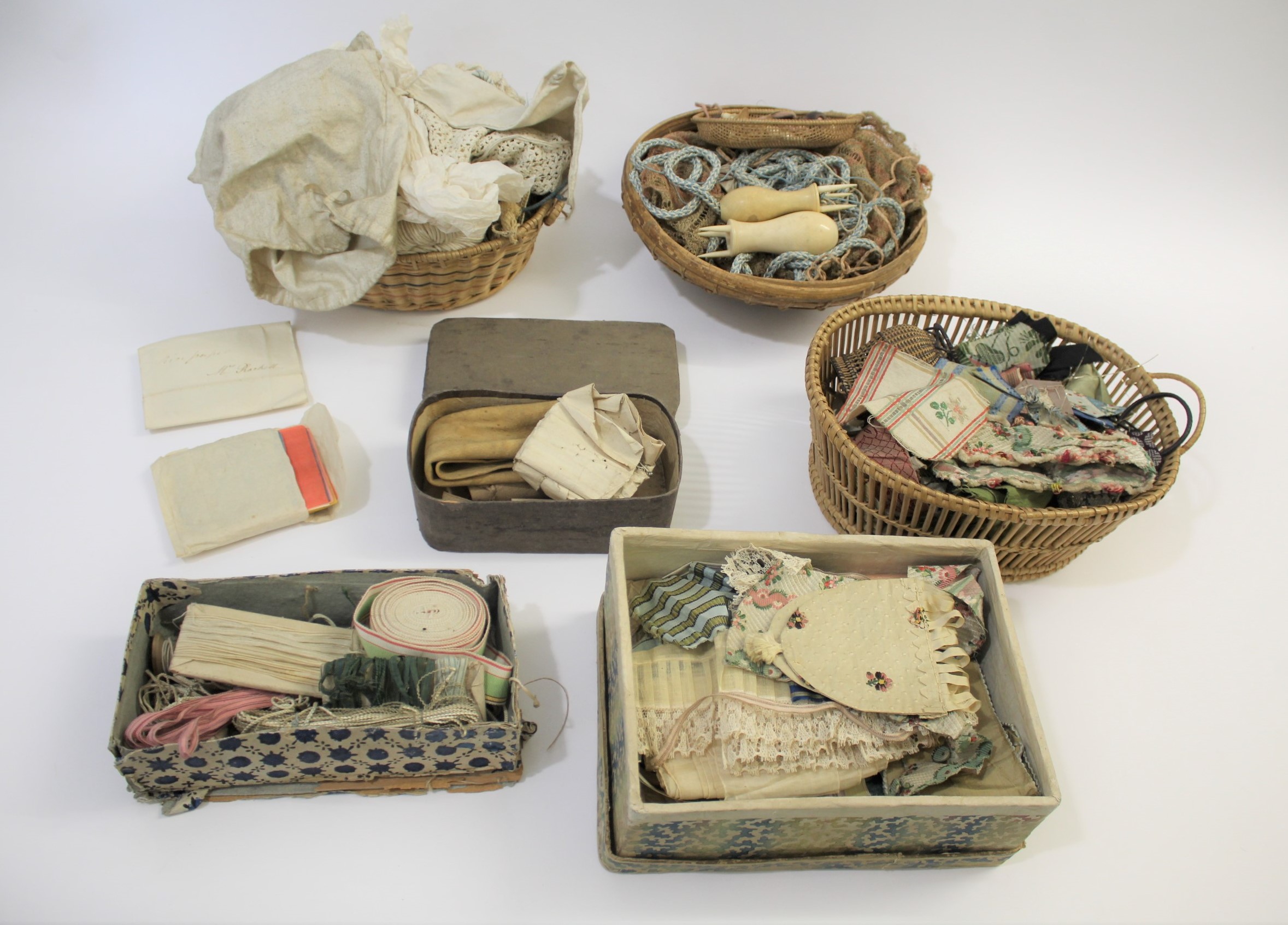 19THC & 20THC SEWING ITEMS a collection including early 20thc sewing baskets, silk ribbons, small