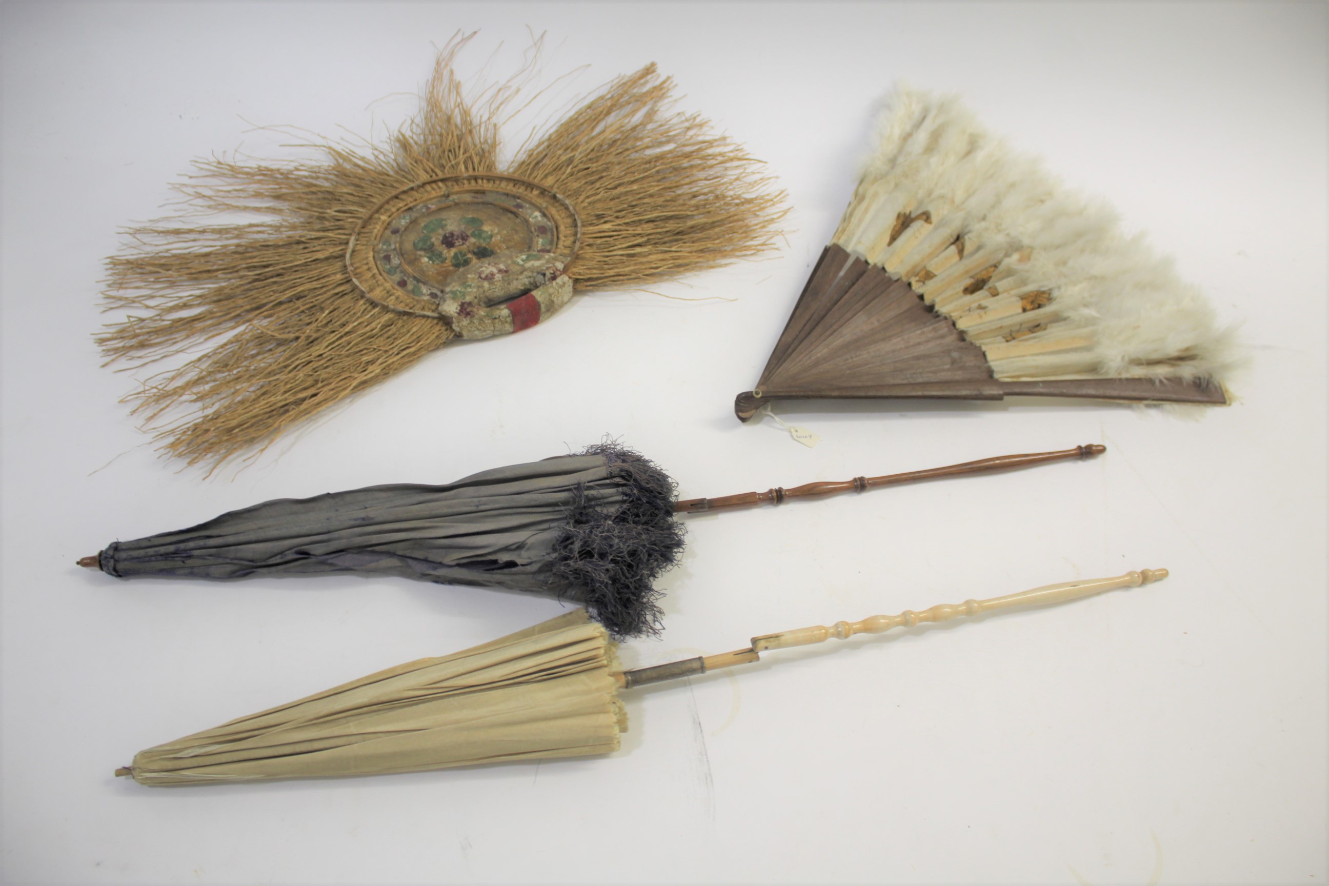 VINTAGE FANS & PARASOLS including a tribal brushwood fan with hand painted decoration, a ostrich