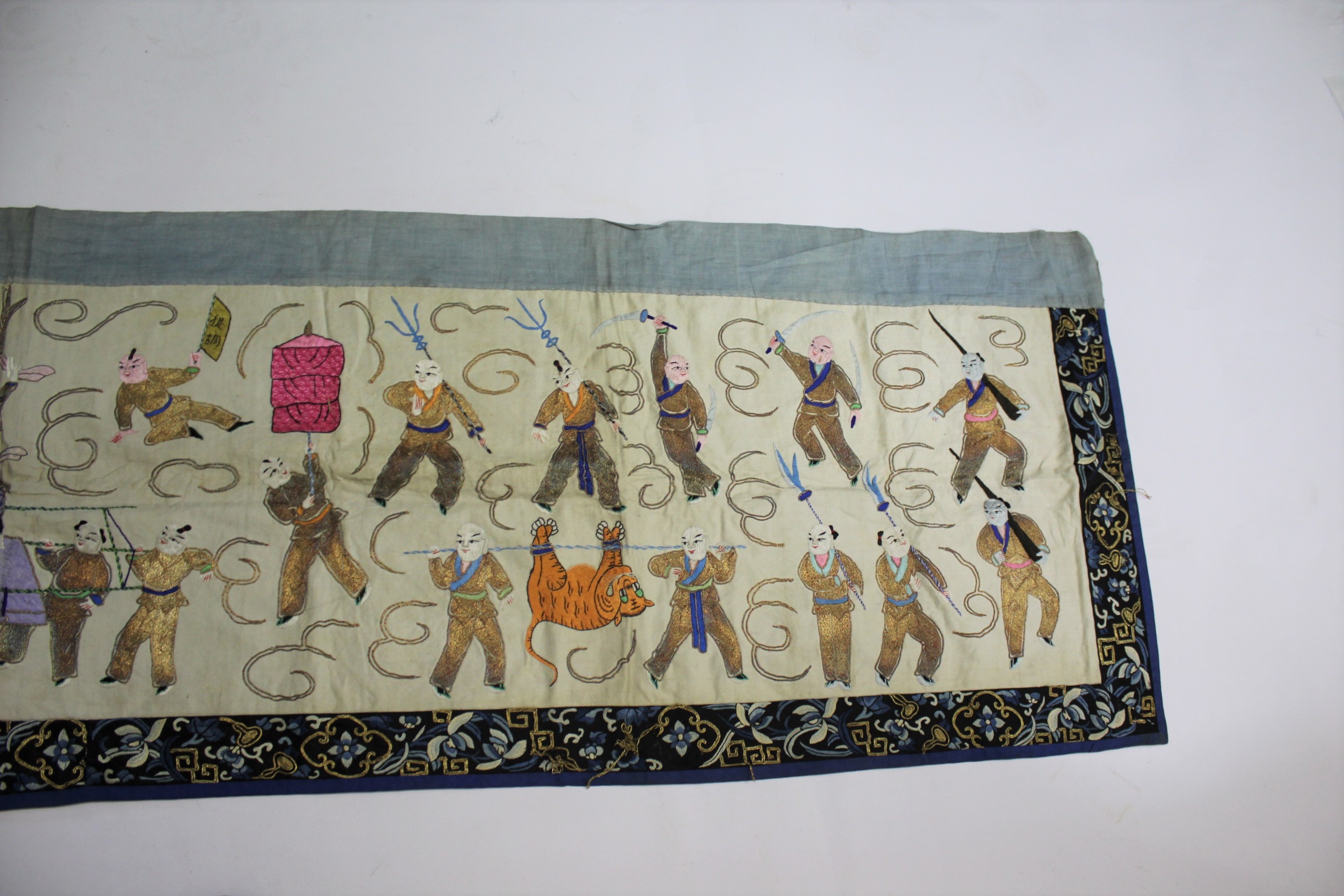 CHINESE SILK TABLE RUNNER early 20thc, the runner embroidered with various processional figures - Image 4 of 9
