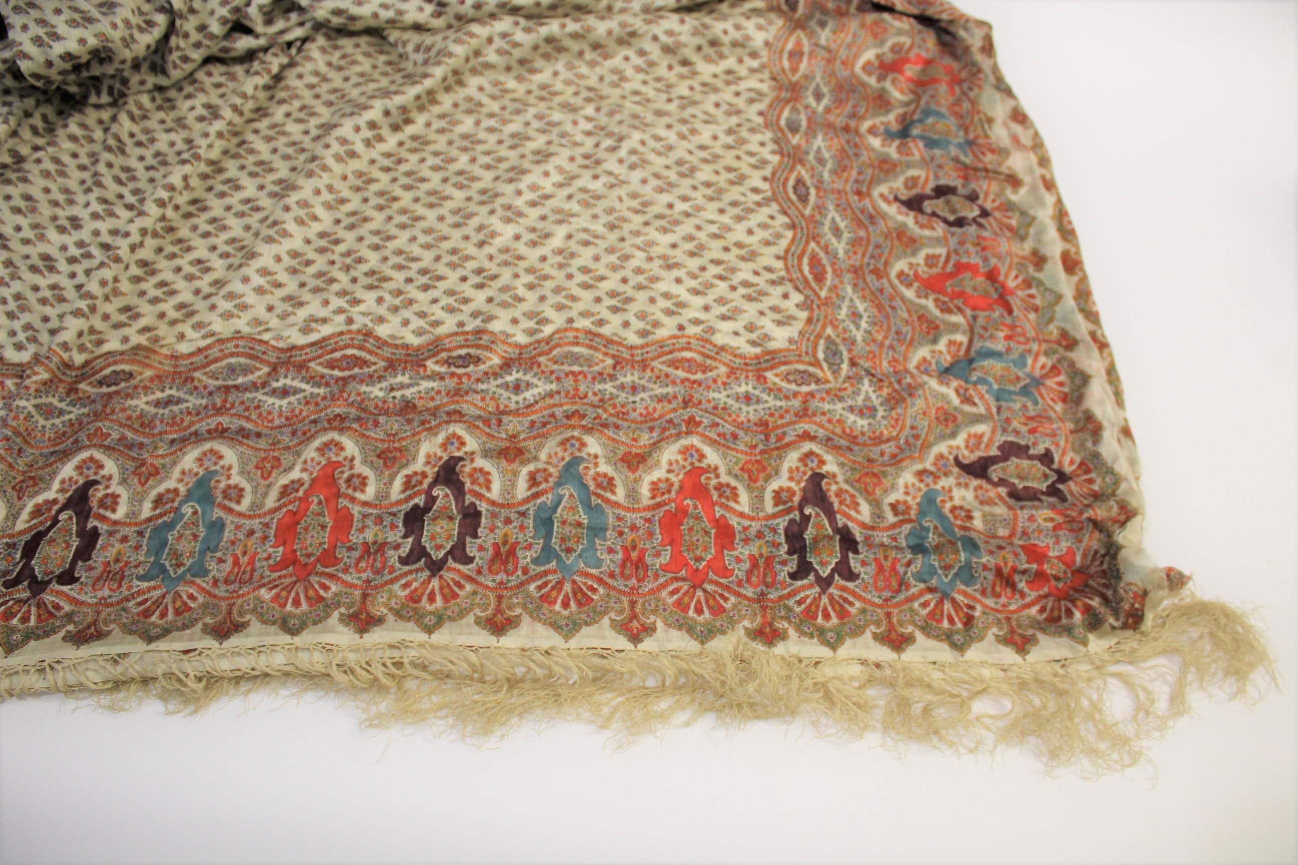 19THC PAISLEY SHAWL a mid 19thc paisley wool cashmere shawl (264cms by 126cms), and also with a fine