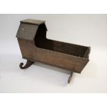 ANTIQUE DOLLS CRADLE probably late 19thc, made in oak with two curved supports. Also with an unusual